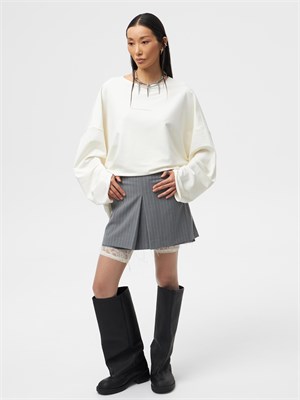 {{photo.Alt || photo.Description || 'Юбка с необработанным краем'}}