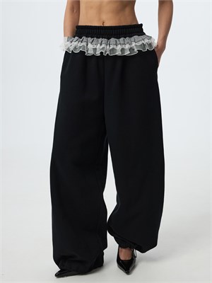 {{photo.Alt || photo.Description || 'Брюки женские из футера с рюшей'}}