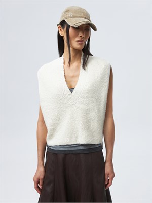 {{photo.Alt || photo.Description || 'Жилет укороченный с молниями'}}